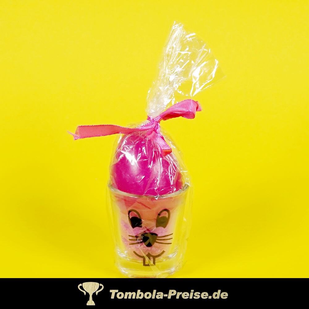 Osterei-Kerze im Glas mit Gesicht