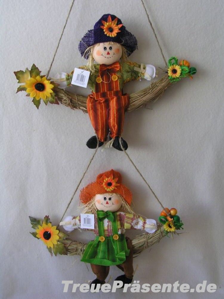 Strohpuppe auf Schaukel